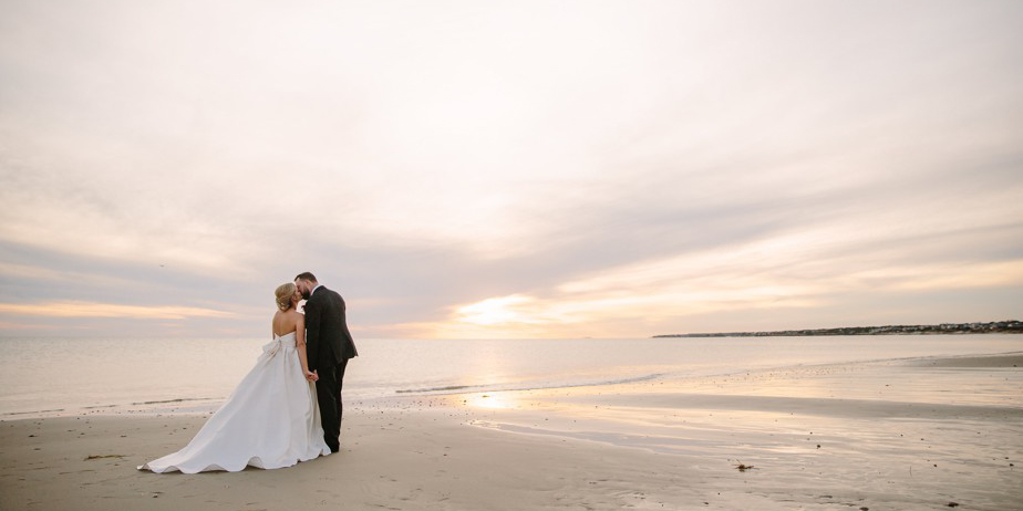 A newly wed couple on a beach.